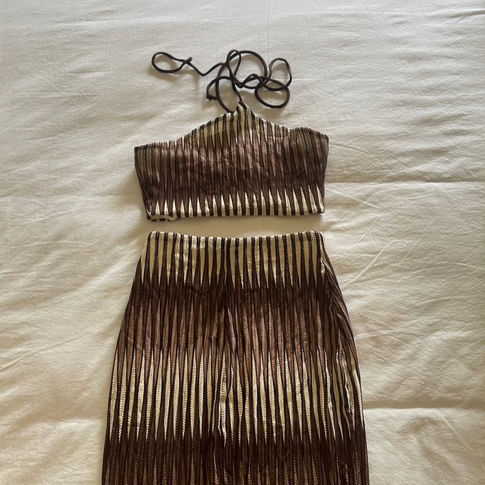 Two piece skirt set worn once, perfect condition.